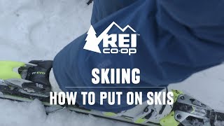 How to Put on Skis  REI [upl. by Riatsila]