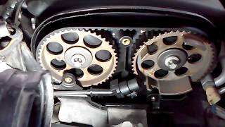 OPEL ASTRA 14 16V HOW TO REPLACE TIMING BELT AND COOLANT PUMP [upl. by Mccomb]