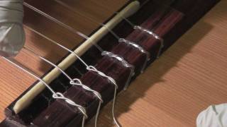 How to restring a classical guitar [upl. by Meelas]